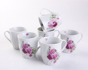 cup or hand painted flower ceramic mug set on the background new.