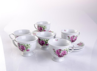 cup or hand painted flower ceramic mug set on the background new.