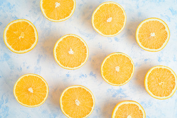 oranges for making juice, pattern, on a blue background