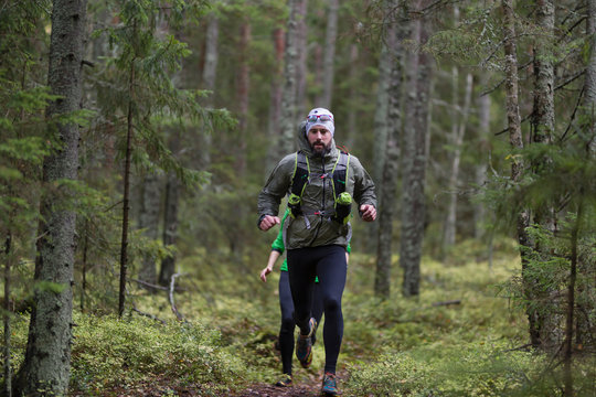 Man running in forest