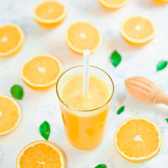 freshly squeezed orange juice and slices of orange fruit