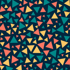 Fototapeta na wymiar Triangles seamless pattern. Colored chaotic triangles, dark blue background. Abstraction for printing, rolls, paper, membranes, fabrics, gifts, etc.