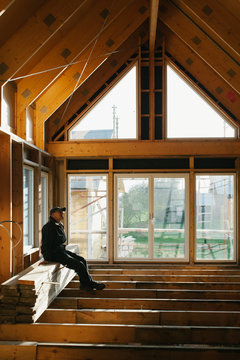 Man Inside House Under Construction