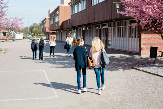 Teenage girls walking together