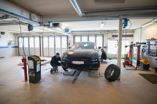 Mechanics changing tires
