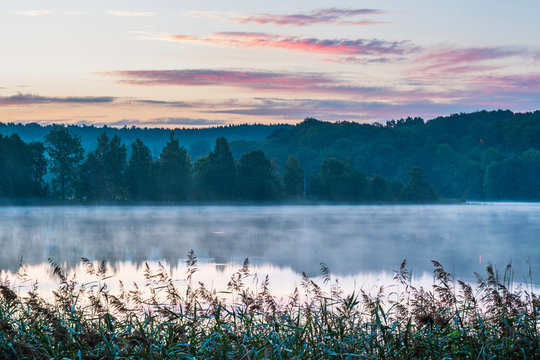 Fog over lake at dawn