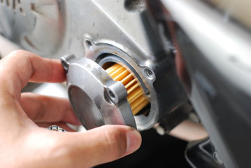 Fototapeta premium New Engine oil filter change