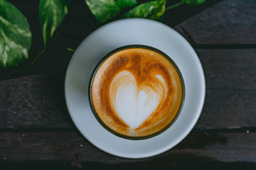 A cup of cappuccino or coffe latte