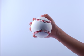 hand hold a professional baseball isolated on white