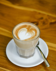 A cup of cappuccino or coffe latte