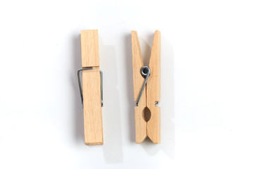 Brown wood clothes peg or clothespin on white background. - Image