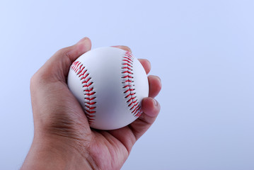 Hand hold A professional baseball isolated on white.