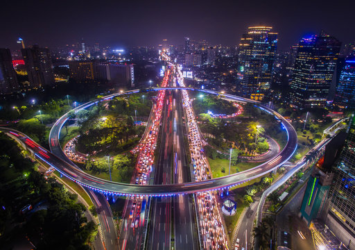 Traffic Jam during rush hour in Semanggi interchange overpass in the night time.