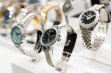 Luxurious Watches In A Store Stand