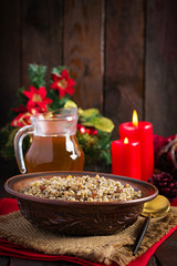 Kutya. Christmas porridge made of wheat grains, poppy seed, nuts, raisins and honey. Christmas kutia. Ukrainian cuisine.