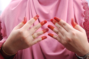 A traditional malaysian wedding bride hand henna art