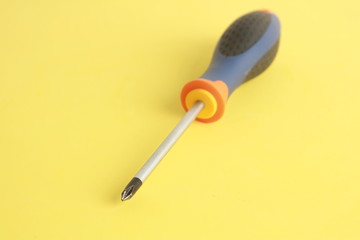 screwdriver tipped star, orange blue and black