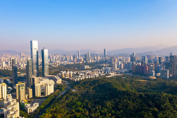 an aerial view of lotus hill park and downtown districts of shenzhen, china