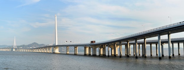 a merged panorama of shenzhen bay bridge in a summer afternoon