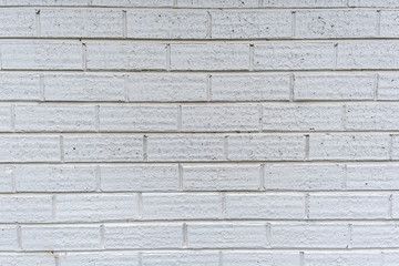 Slim modern brick wall painted in white background texture