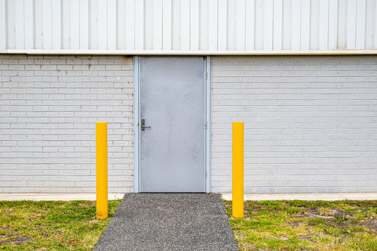 White Back Door To A Large Warehouse - Closeup