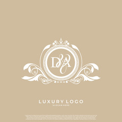 Logo Initial letter DA luxury vector mark, gold color elegant classical symmetric curves decor. editable file EPS10.
