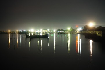Traditional fishing vessels that still use traditional fishing gear, this boat is made of wood that is resistant to sea water. Fishing boats dock at the seashore.