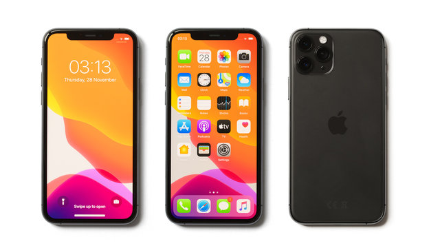 Riga, Latvia - November 28, 2019: Apple iPhone 11 Pro showing locked screen, home screen and back side of the phone.