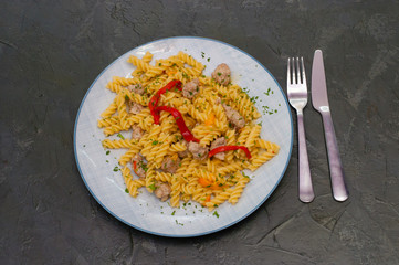 Italian pasta with meat, cheese, spices, parsley and red tomato sauce. Gourmet traditional food