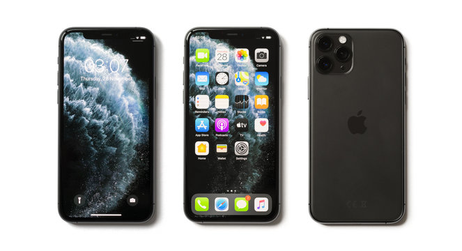 Riga, Latvia - November 28, 2019: Apple iPhone 11 Pro mobile phones with locked screen, home screen and back side with camera lenses.
