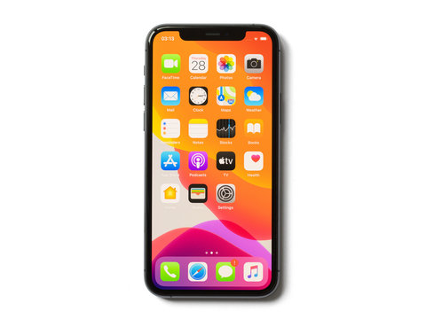 Riga, Latvia - November 28, 2019: Apple iPhone 11 Pro with icons of home screen, isolated on white background.