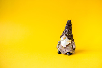 Christmas gnome on a yellow background