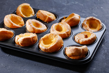 close-up of Yorkshire puddings in a baking tray