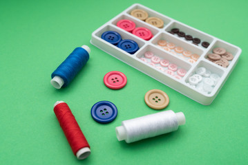 colored buttons on green background