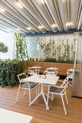 Hotel restaurant terrace interior with heater