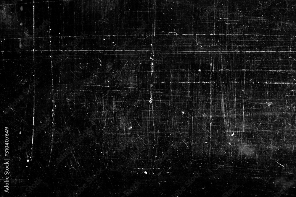 Poster grunge background with scratches on a black