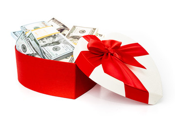Dollars in a  gift box on a white background.  Valentine's Day. Birthday. Saving money.