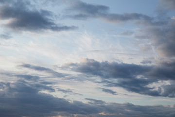 Fototapeta na wymiar Beautiful sunrise with dark clouds. Sky backdrop