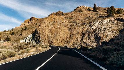Mountain asphalt road in the mountains. Asphalt in the mountains is black. Beautiful road in the mountains.