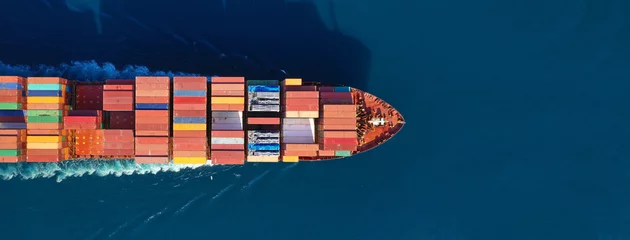 Foto op Plexiglas Aerial drone photo of industrial cargo container carrier cruising the open ocean deep blue sea © aerial-drone