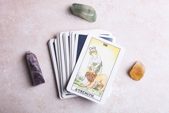 Fortune-telling tarot cards and mineral stones