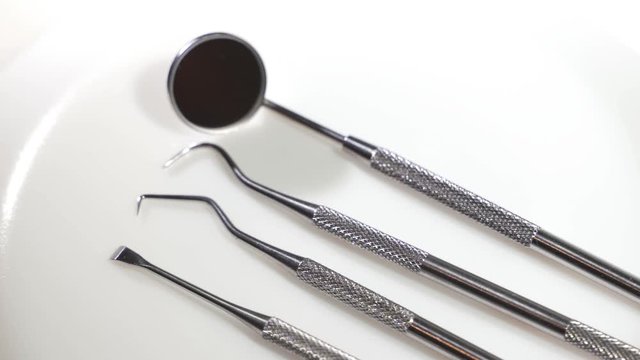Professional Dentist tools in dental office. Dental Hygiene and Health conceptual image