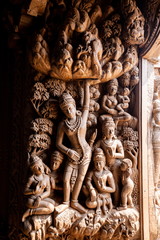 Fototapeta na wymiar wooden heritage carving art wall in temple .
