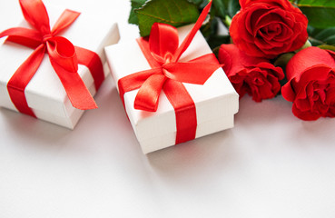 Red roses and gift boxes