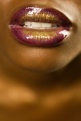 Woman With Purple And Gold Lipstick