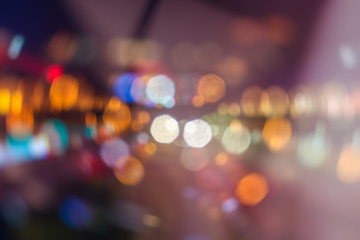 Blurred skyscrapers by night with lights trail