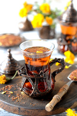 Turkish traditional tea on a white wooden background