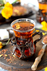 Turkish traditional tea on a white wooden background