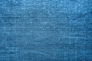 Homespun linen fabric. Textile texture. Classic blue abstract background. Top view, flat lay.