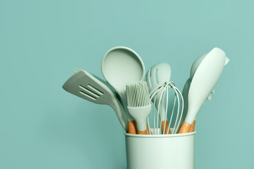 Kitchen utensils background with copyspace, home kitchen decor concept, kitchen tools, rubber...